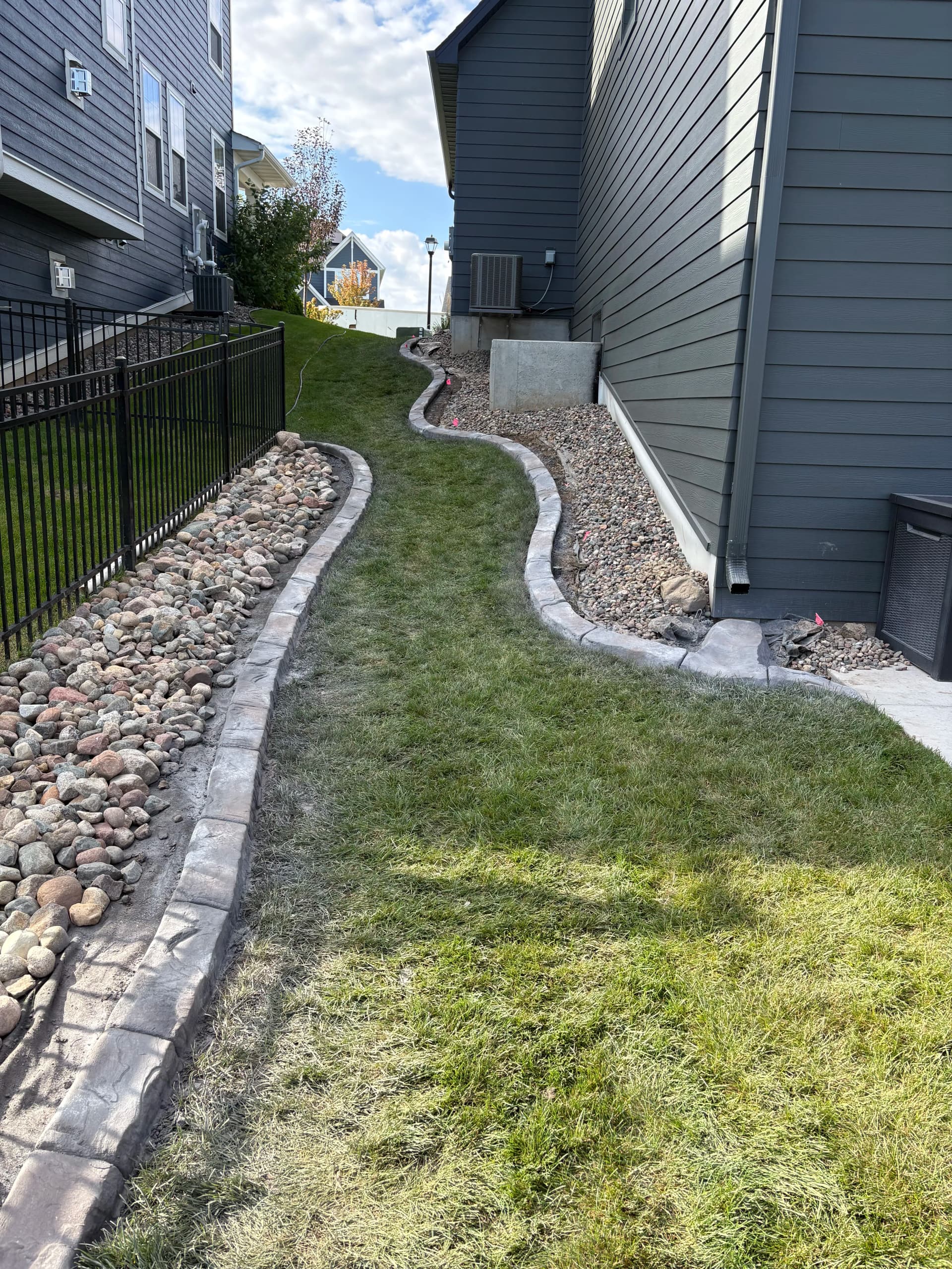 Custom Curbing and Rock Landscaping Build in Progress image
