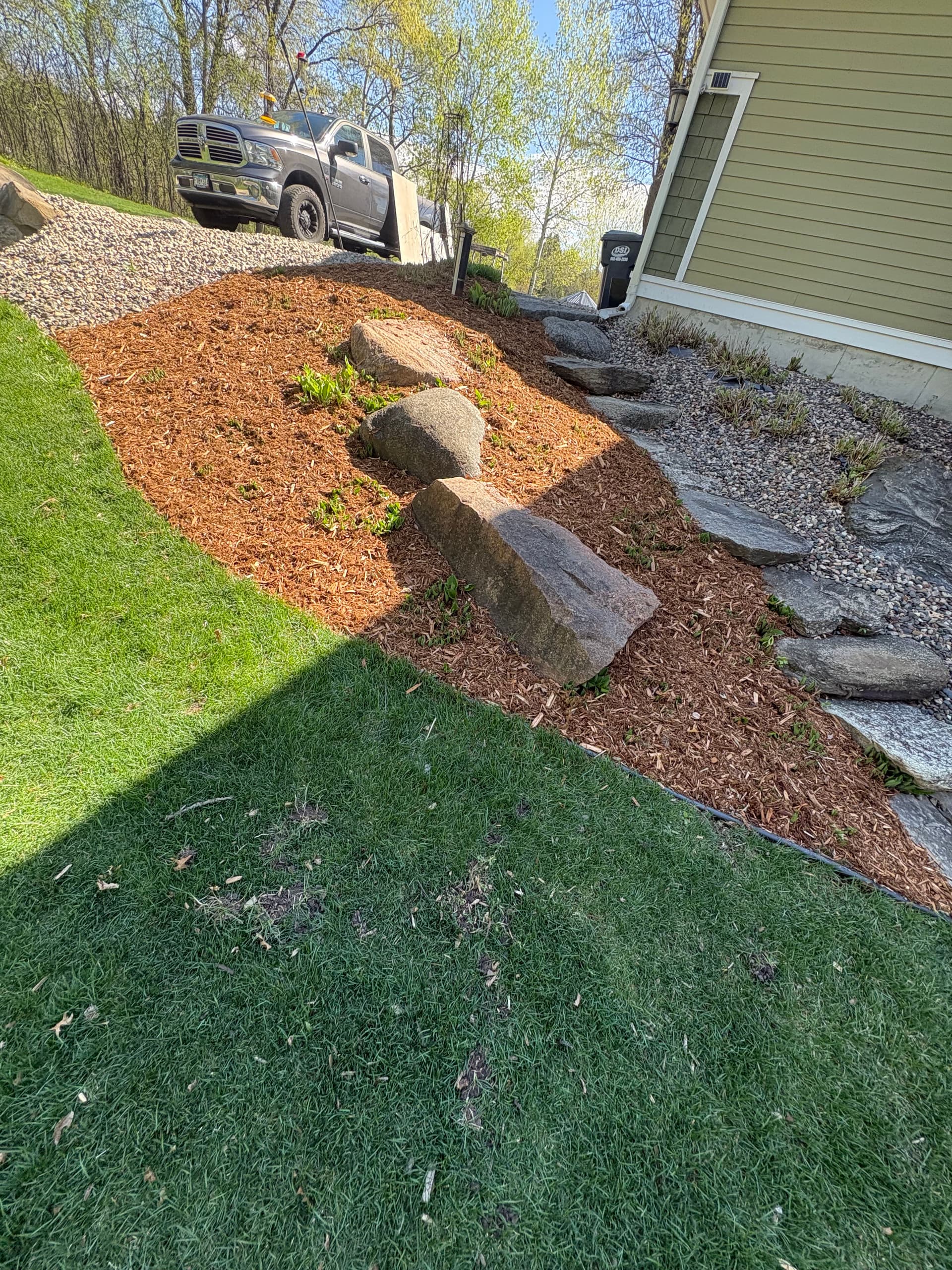 Fresh Mulch Installation Across Multiple Landscape Beds image