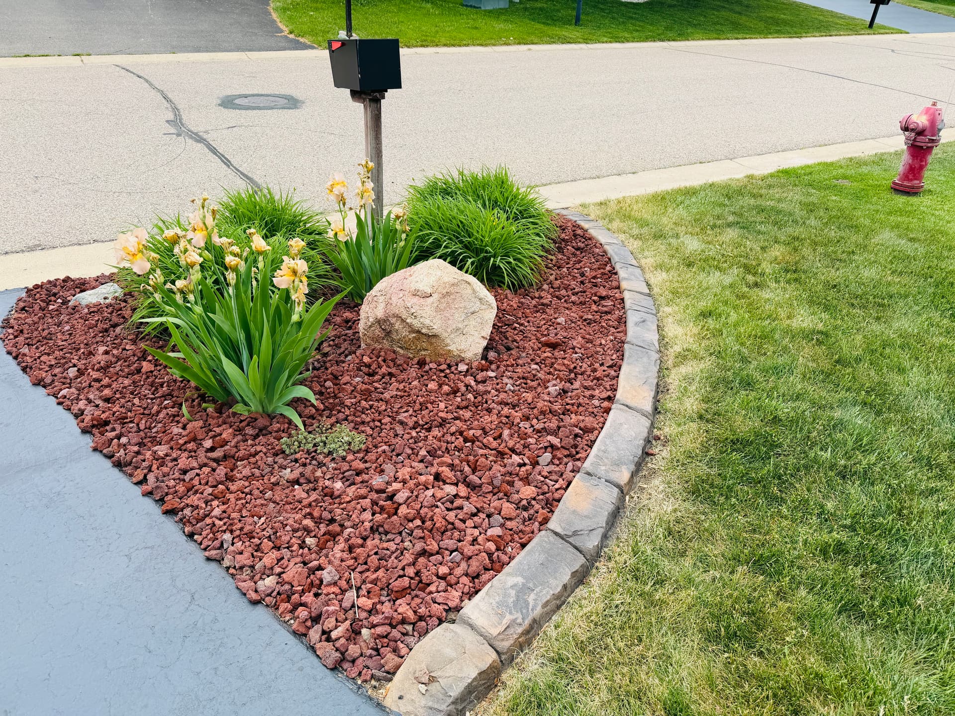 Gallery photos for Landscape Curbing, Rock, and Plants Give This Yard a Sharp New Look: Image #4
