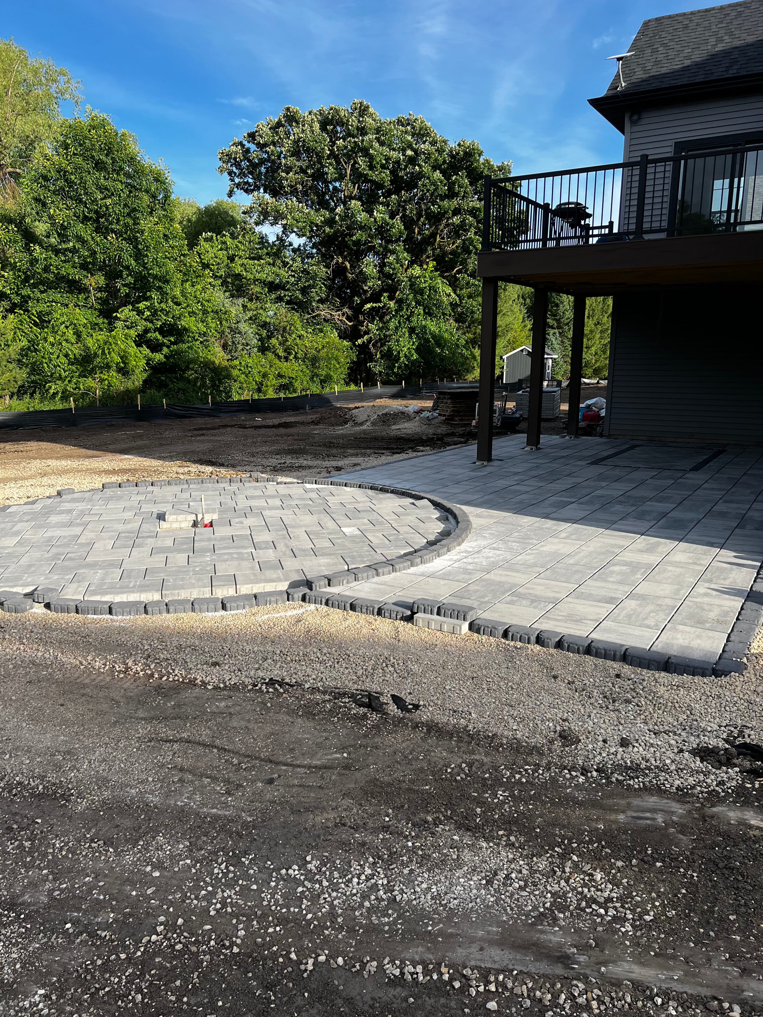 Project Custom Paver Patio Build With a Curved Fire Pit Area image