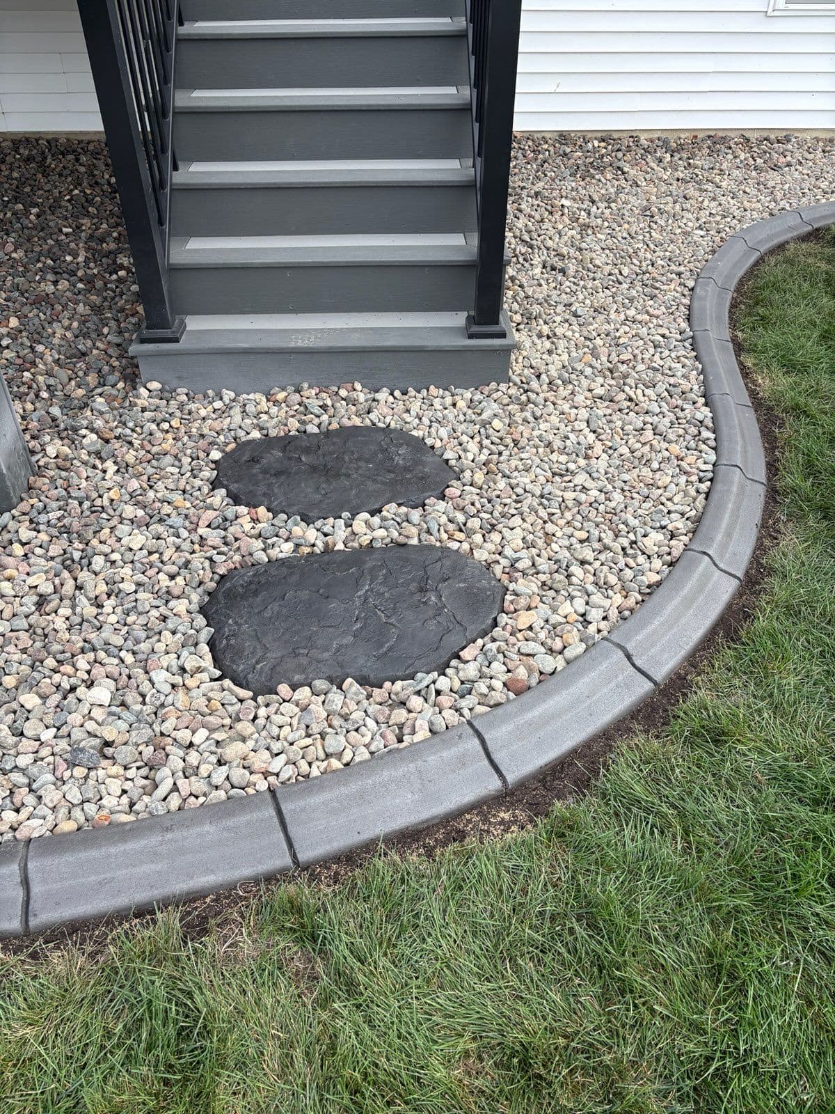Elegant Staircase Transformation with Stepping Stones and Mowers Edge image