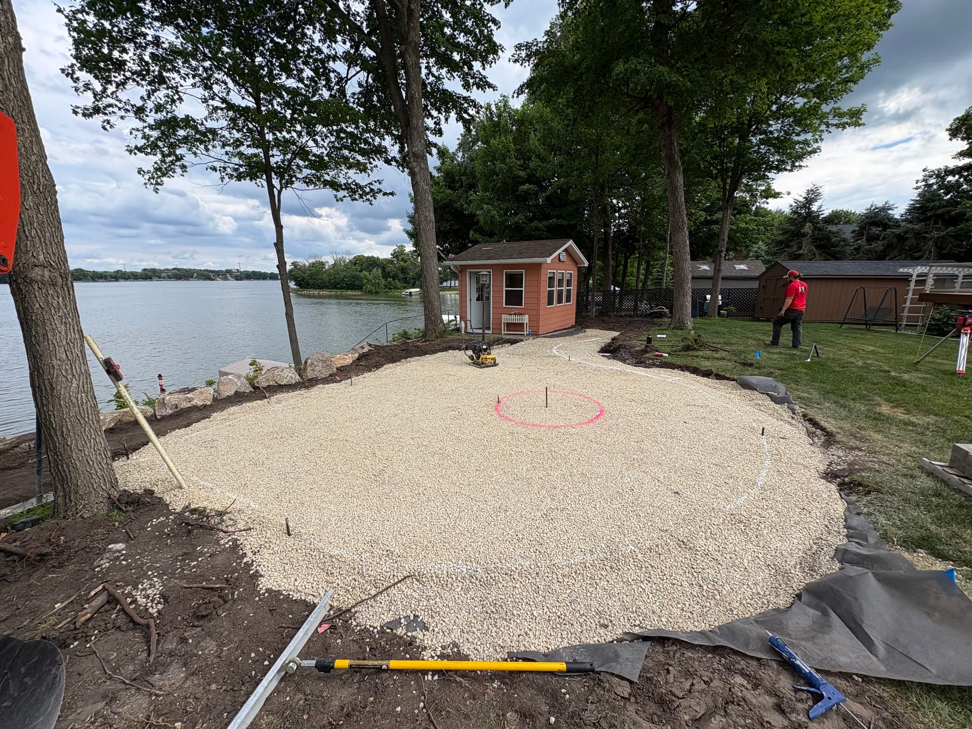 Gallery photos for Cedar Lake Backyard Getting a Boulder Wall and Fire Pit Patio: Image #2