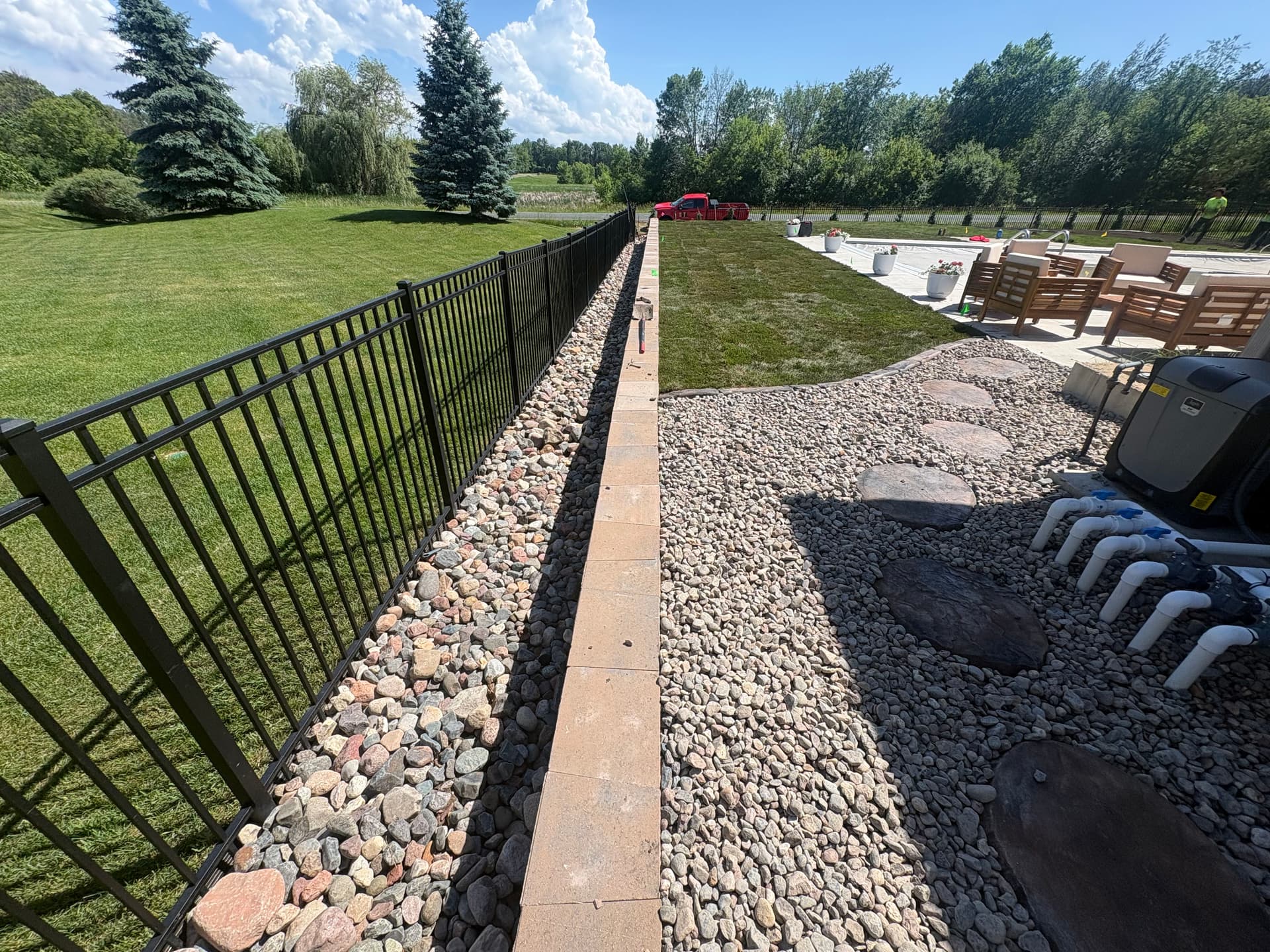 Gallery photos for Backyard Overhaul With Sod, Rock, Retaining Wall and Pool Access Path: Image #1