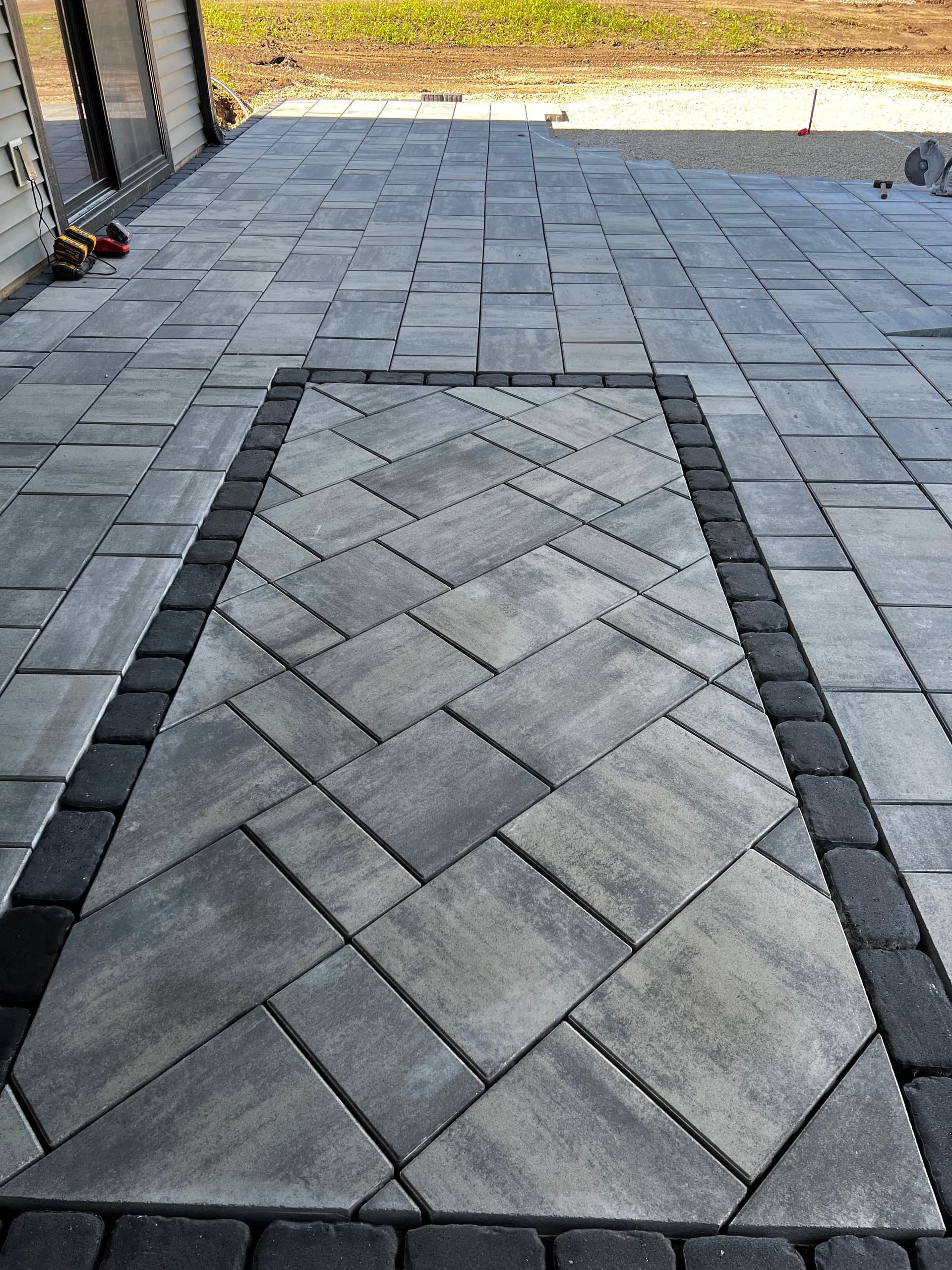 Gallery photos for Custom Paver Patio Build With a Curved Fire Pit Area: Image #1