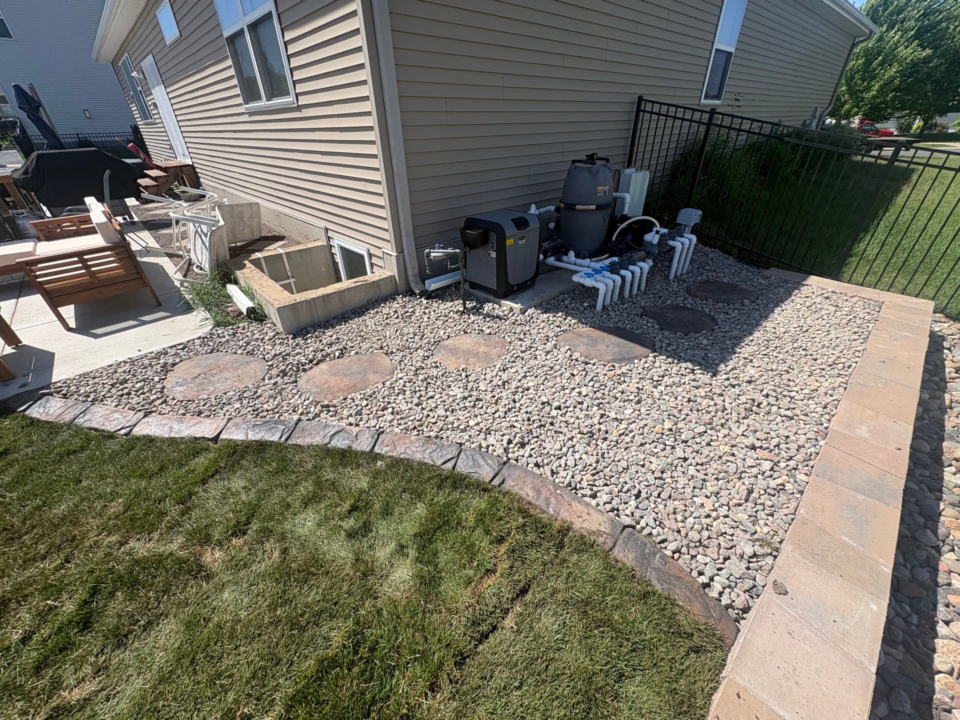 Gallery photos for Backyard Overhaul With Sod, Rock, Retaining Wall and Pool Access Path: Image #4